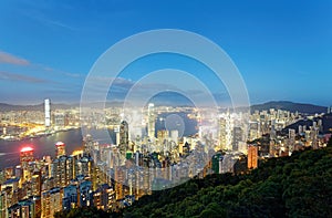 Night scenery of Hong Kong viewed from top of Victoria Peak with city skyline