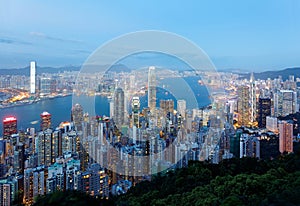 Night scenery of Hong Kong viewed from top of Victoria Peak with city skyline of crowded skyscrapers