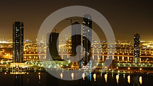 Night seen of Sharjah and Dubai cities on a lake