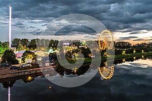 Night shot of folk festival with ferris wheel in Regensburg