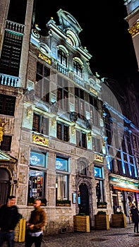 Night shot of illuminated facade of Hard Rock Cafe on the Grand Place or Square or Grote Markt or Grand Market that is the central