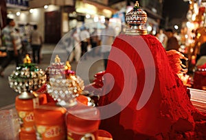 Night shot of Vermillion or kumkum powder sold by street vendor