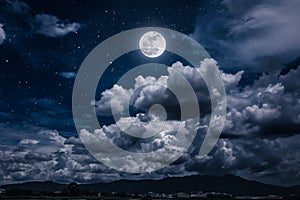 Night sky with bright full moon and dark cloud, serenity nature