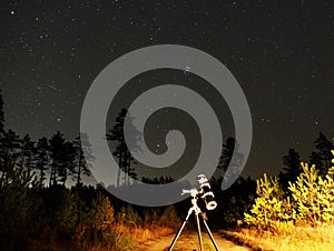 Night sky stars observig over telesocpe Plaiades sar vluster photo