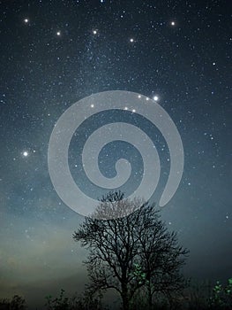 Night sky stars Cygnus and Lyra constellation clouds nightscape