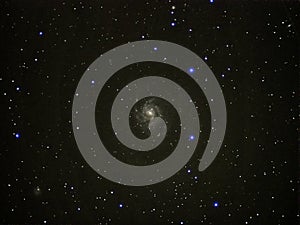 Night sky stars and spiral Galaxy M101 observing