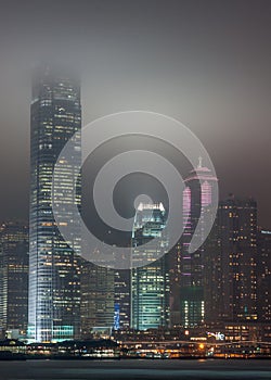 Night skyline centered around International Finance Center, Hong Kong Island, China