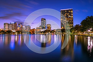 Night skyline of Orlando, Florida, with Lake Eola in the foreground