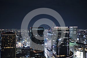 Night skyline of Osaka city. Umeda Sky Building in Japan.