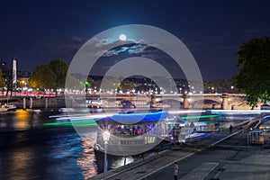 Night slow motion view on river Seine in Paris