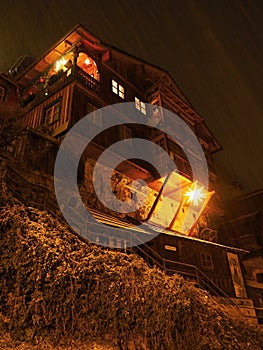 Night snowfall-The village of Hallstatt, Austria, covered with snow in the winter time just before Christmas photo