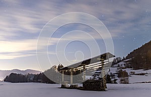 Night snowy scene in Tuhinj valley, Slovenia photo