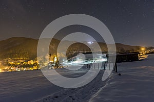 Night snowy scene in Tuhinj valley, Slovenia