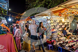 Night street market in Hanoi Old Quarter, people can seen exploring around it.