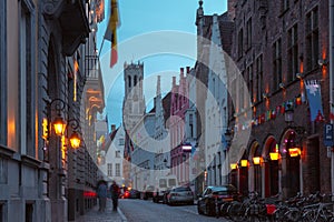 Night street and tower Belfort in Bruges, Belgium