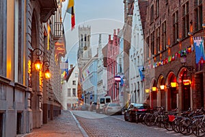 Night street and tower Belfort in Bruges, Belgium