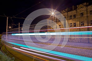 Night street view with tram tracers in Daugavpils city