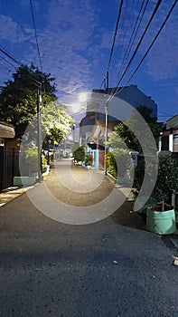 Night suburban sidewalk with clea sky background photo