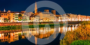 Night summer view of Basilica of Santa Croce church and Arno river. Panoramic evening cityscape of Florence, Tuscany, Italy. Trave
