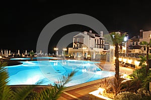 Night swimming pool. Summer.