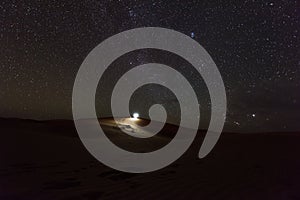 Night time landscape of the stars and sand dunes in the Sahara Desert, Merzouga, Morocco, Africa