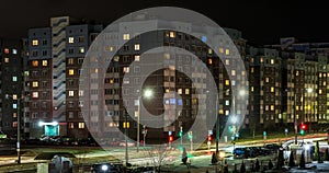 night time lapse with light in windows of multistory buildings and flash of cars. life in a big city. Serenade of light