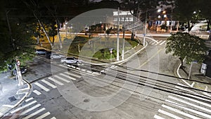 Night time lapse of traffic on cross roads in Sao Paulo city