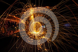 Night time long exposure steelwool light painting street art