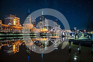 Night time Melbourne across the Yarra River photo