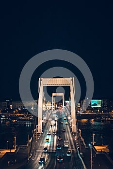 Night time traffic over the Elisabeth bridge. It crosses Danube river and connect Buda and Pest together. Budapest, Hungary