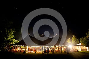 Night time wedding tent with stars visible.