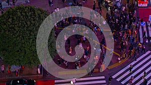 Night timelapse crossing in Shibuya Tokyo high angle middle shot zoom