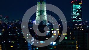 A night timelapse of Tokyo sky tree at the urban city in Tokyo tiltshift panning