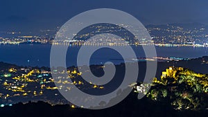 Night timelapse view of the airport in Nice and Mediterranean coastline on the French Riviera