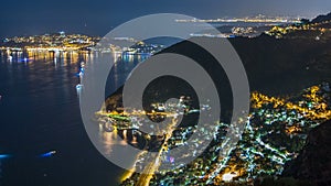 Night timelapse view of the Mediterranean coastline of the town of Eze village on the French Riviera