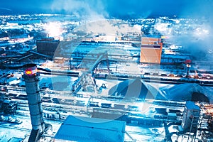 Night top view of steel mill. Smog, smoke and flame from the chimneys