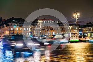 Night traffic in the capital on the high-speed highway.Big city lights.Central district