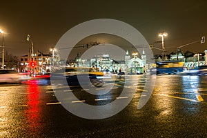 Night traffic in the capital on the high-speed highway.Big city lights.Central district