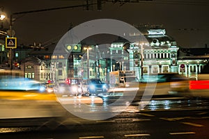 Night traffic in the capital on the high-speed highway.Big city lights.Central district