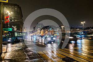 Night traffic in the capital on the high-speed highway.Big city lights.Central district