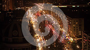 Night traffic, cars on the street road in a busy city, urban view. Kyiv, Ukraine