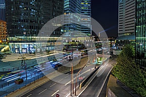 Night Traffic in La Defense Business District Paris With Eiffel Tower