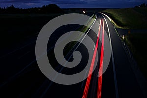 Night traffic on a motorway. Speed, distance, perspective