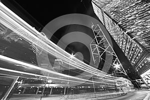 Night traffic and skyline of Hong Kong city in monochrome