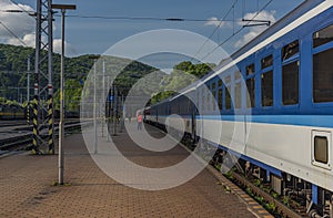 Night train with sleeping coaches and car motorcycle coaches Kysak station