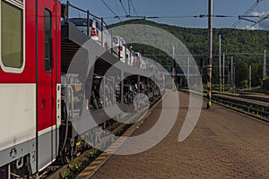 Night train with sleeping coaches and car motorcycle coaches Kysak station