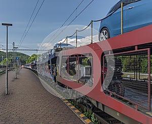 Night train with sleeping coaches and car motorcycle coaches Kysak station