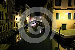 Night in Venice city, Italy. Sea, water, light, ancient buildings, history, timeless architecture, art, colours and tourism