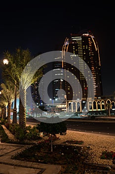 Night view of Abu Dhabi skyscrapers, United Arab Emirates.