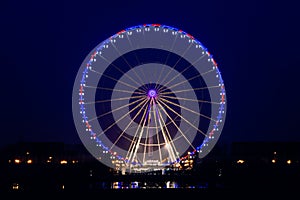 Night view of big wheel in Paris